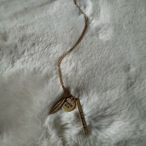 Gold Pendant Necklace with Feather Charm